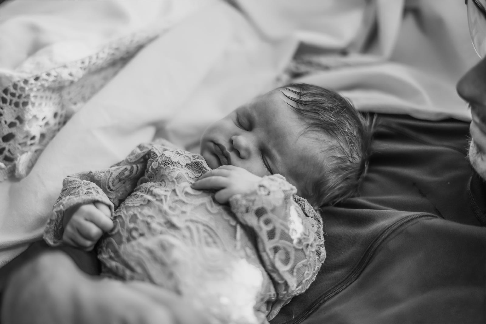 Black and white newborn portrait in lace